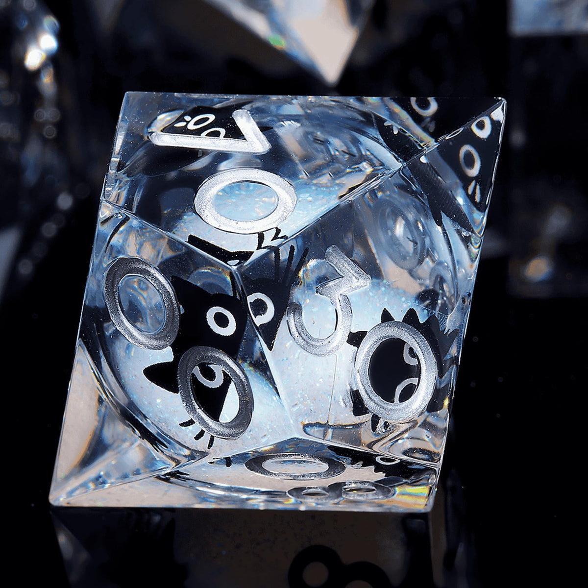 Hand-finished Froggod resin dice with cat-themed inclusions.