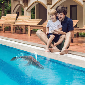 Fromeasy water-friendly toy encourages imaginative battles between Mosasaurus and shark.