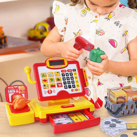 Children handling play money and coins during role play
