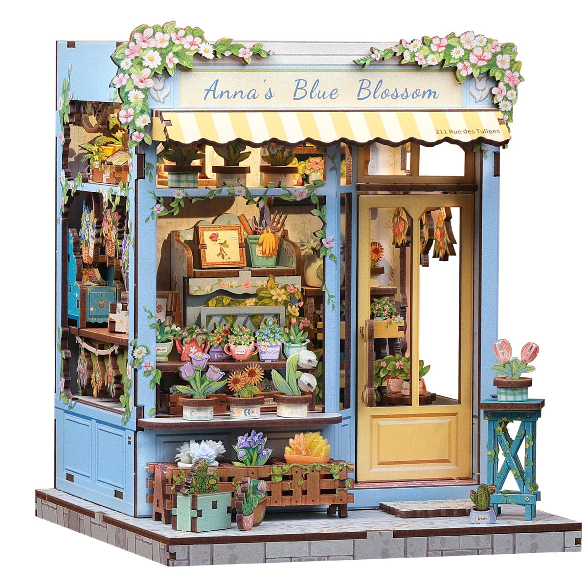 Fsolis Book Nook Kit blue blossom scene enhances shelf decor and cozy ambiance.