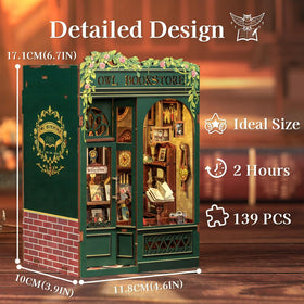 Fsolis Book Nook Kit LED-lit interior adds warm ambiance to a desk setup.