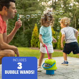Fubbles bubble play outdoors at the beach with No-Spill Bucket