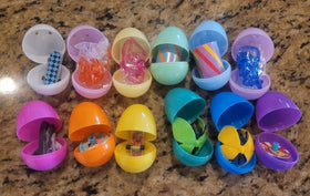 Fun Express surprise eggs with spin tops as simple, reusable rewards.