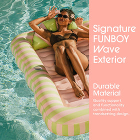 FUNBOY dry-use tanning float for sunbathing on grass.