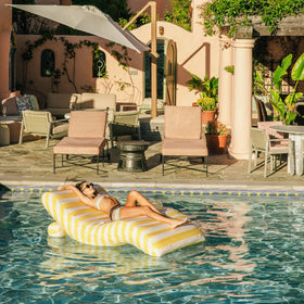 FUNBOY giant 70-inch-long pool float for extended comfort.