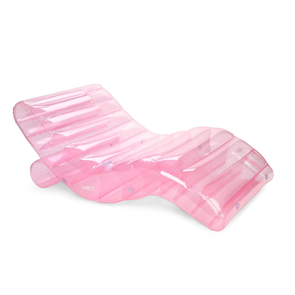 FUNBOY giant inflatable chaise lounger in pale pink clear material for poolside lounging
