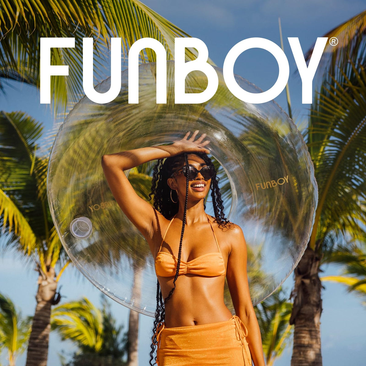 FUNBOY Giant Super Clear Ring Tube Float enhances poolside lounging