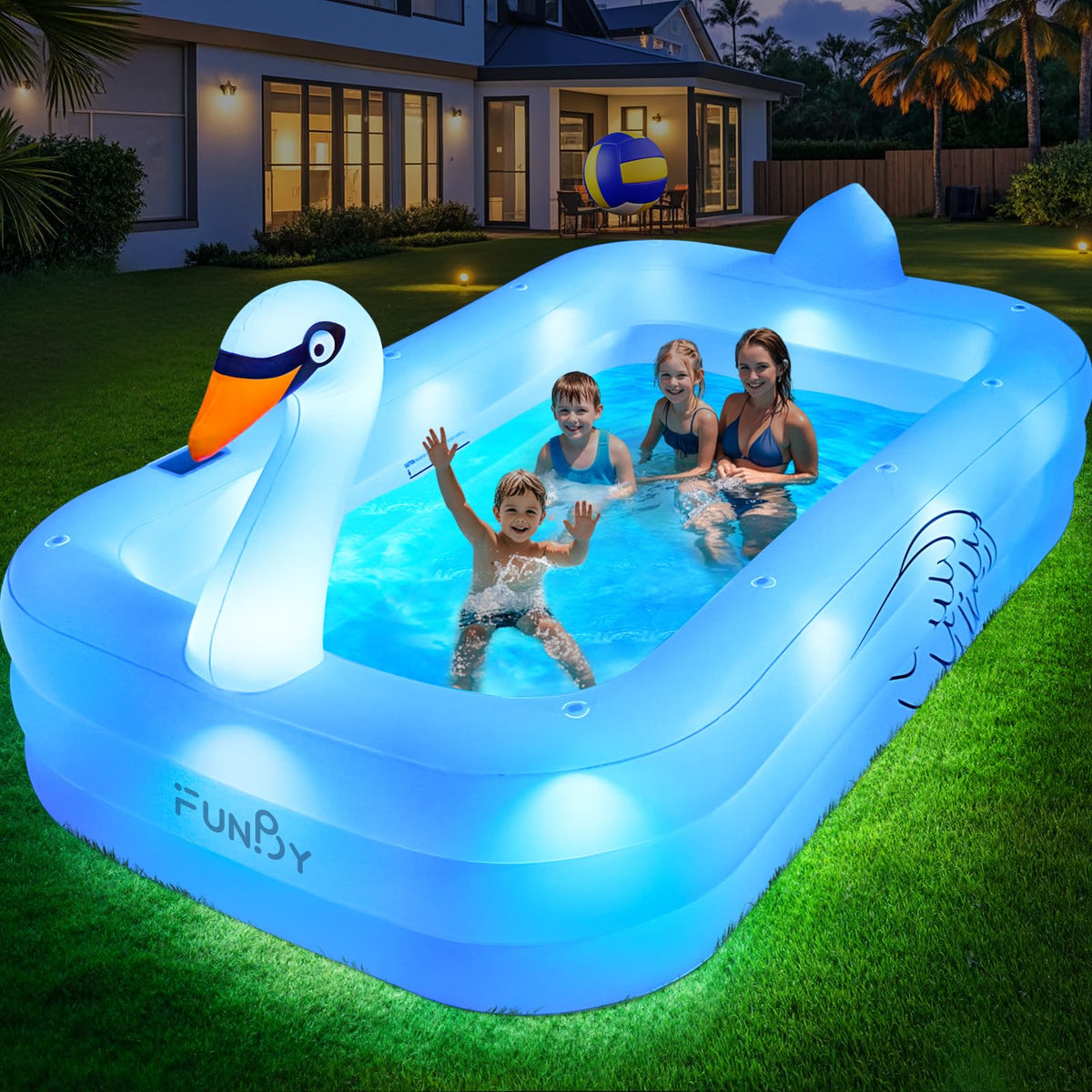FunBy Solar Swan pool lit at night creating ambient backyard lighting