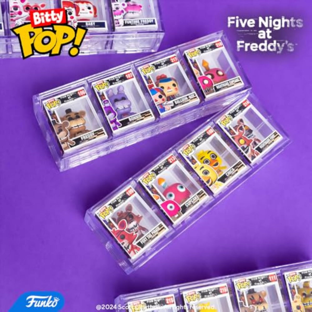 Funko Bitty Pop! acrylic display case holds four figures in a neat setup.