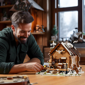 FunWHOLE Hunting Cabin two-level interior with bedroom and living area