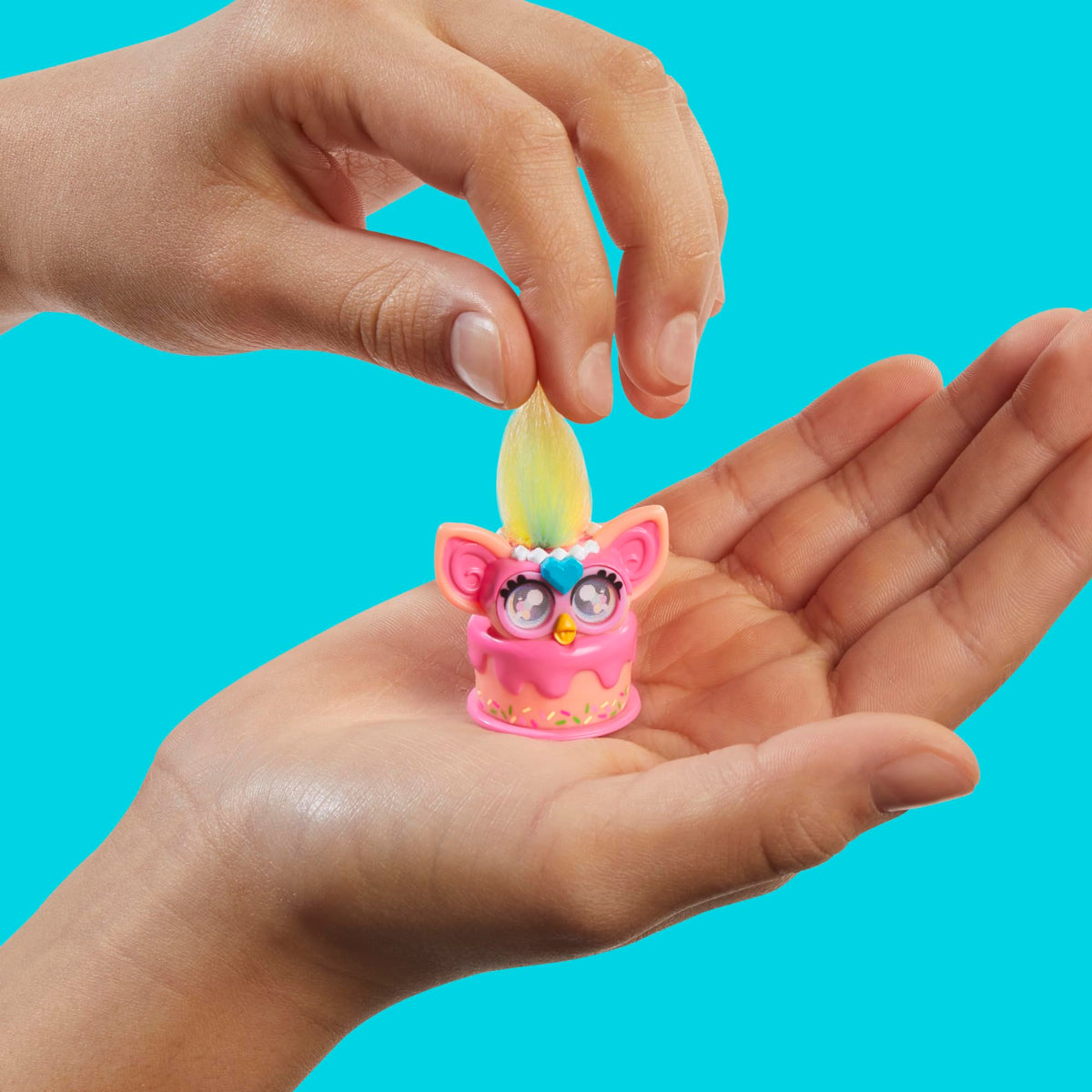 Furby Minis cake motif figure to spark birthday storytelling.