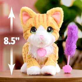 FurReal Bella orange and white fur with sparkly green eyes invites imaginary pet care.