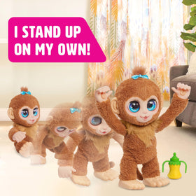 FurReal Peanut drinks from the banana bottle with adorable sounds.