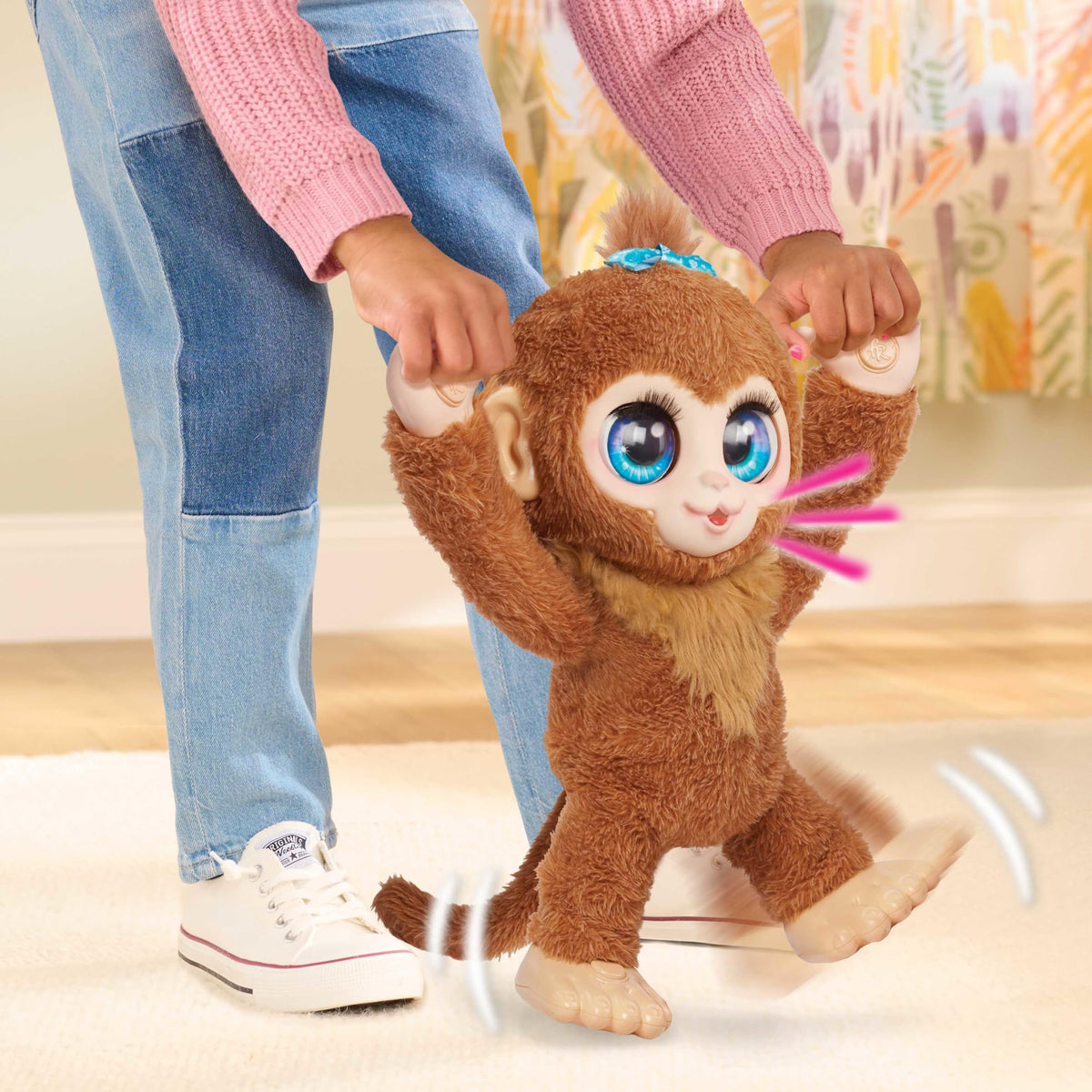 FurReal Peanut's blue and purple eyes blink with expressive charm.