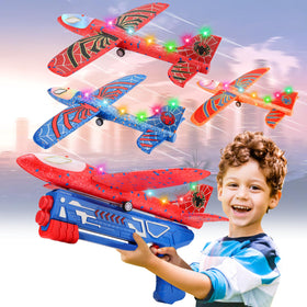 Fuwidvia 3-pack airplane launcher toys in action for outdoor fun.