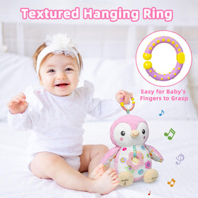 Fuzqq penguin plush supports tummy time with bright visuals and safe design