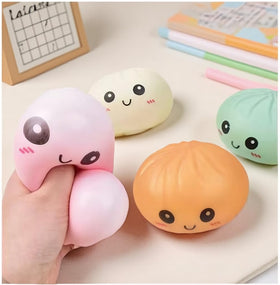 fyjous squeezable dumplings with cute faces for tactile focus