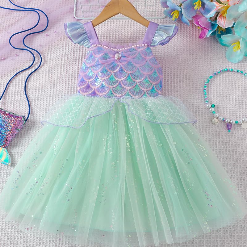 Fylytota purple-gradient mermaid scales glow on the torso for a shimmering tail look.