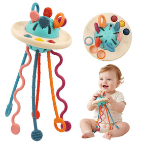 Fyxttalor UFO pull-string toy with soft side buttons for sensory exploration.