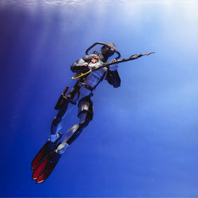 Scuba gear with air tank highlighting underwater action possibilities