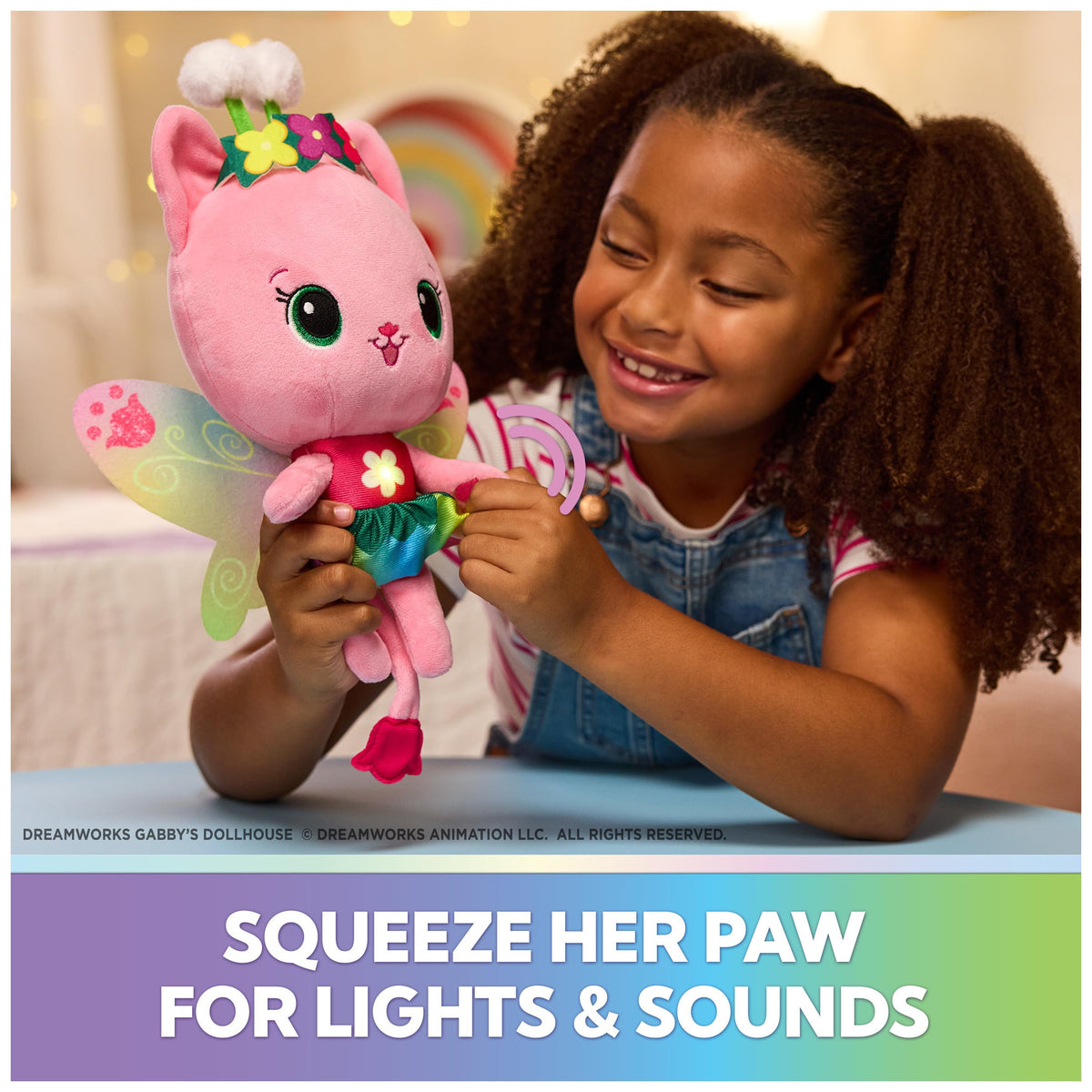 Gabby’s Dollhouse Kitty Fairy in rainbow dress shines during play.