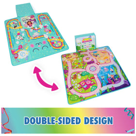 Gabby's Dollhouse Cakey Cat figure engaging in pretend play on mat.