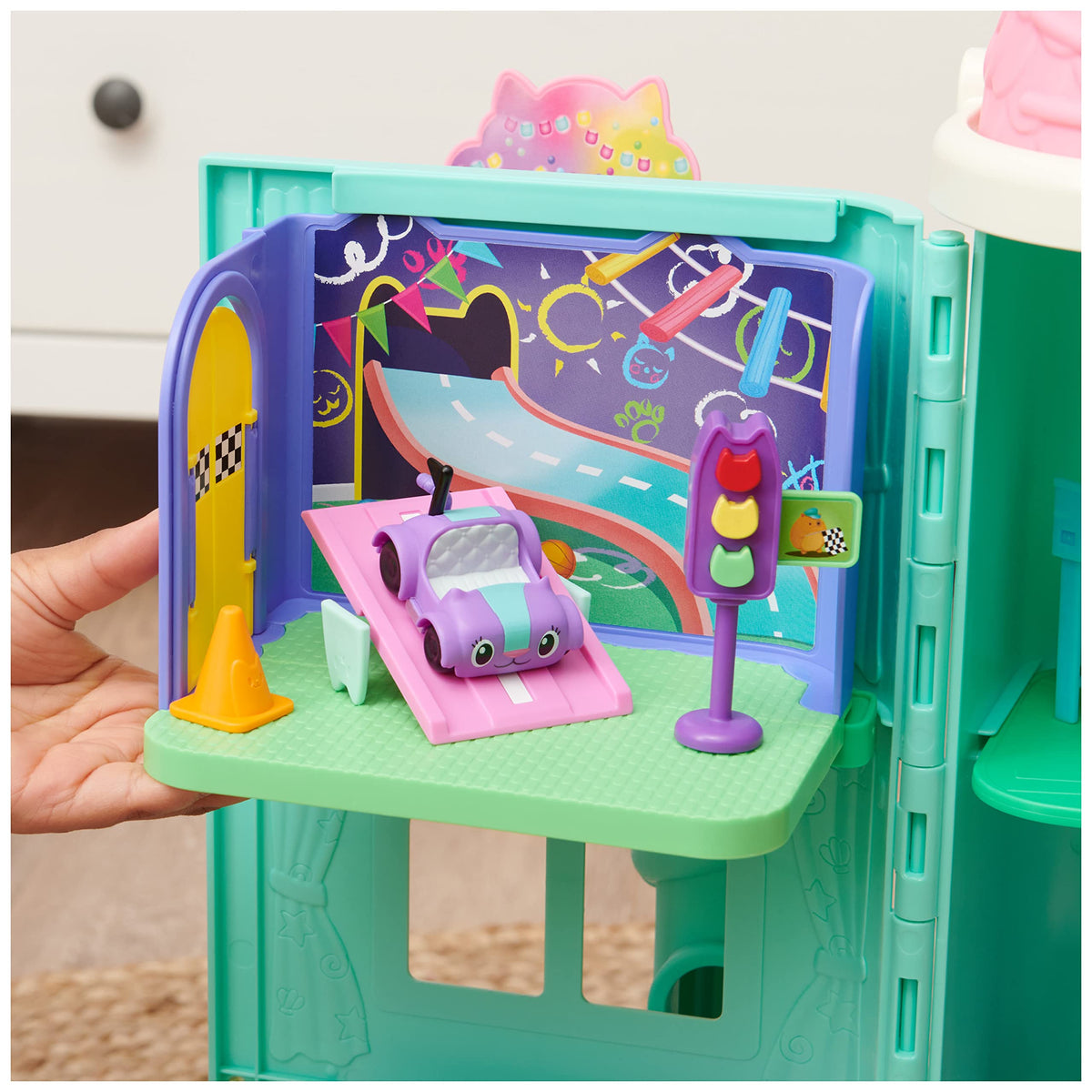 Dollhouse Delivery reveals a traffic cone for expanded play scenarios.