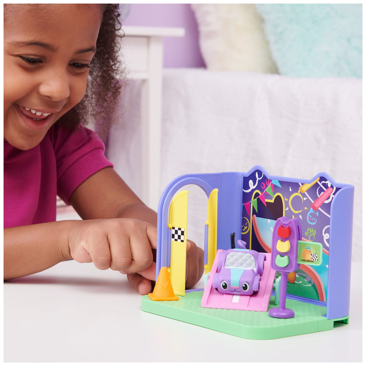 Street-themed see-saw ramp for dynamic doll play in Gabby’s Dollhouse.