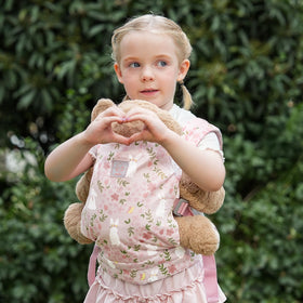 Gagaku carrier with adjustable straps fits growing kids and various doll sizes.