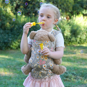 GAGAKU doll carrier in green for front outward carry, ideal for expressive role play.