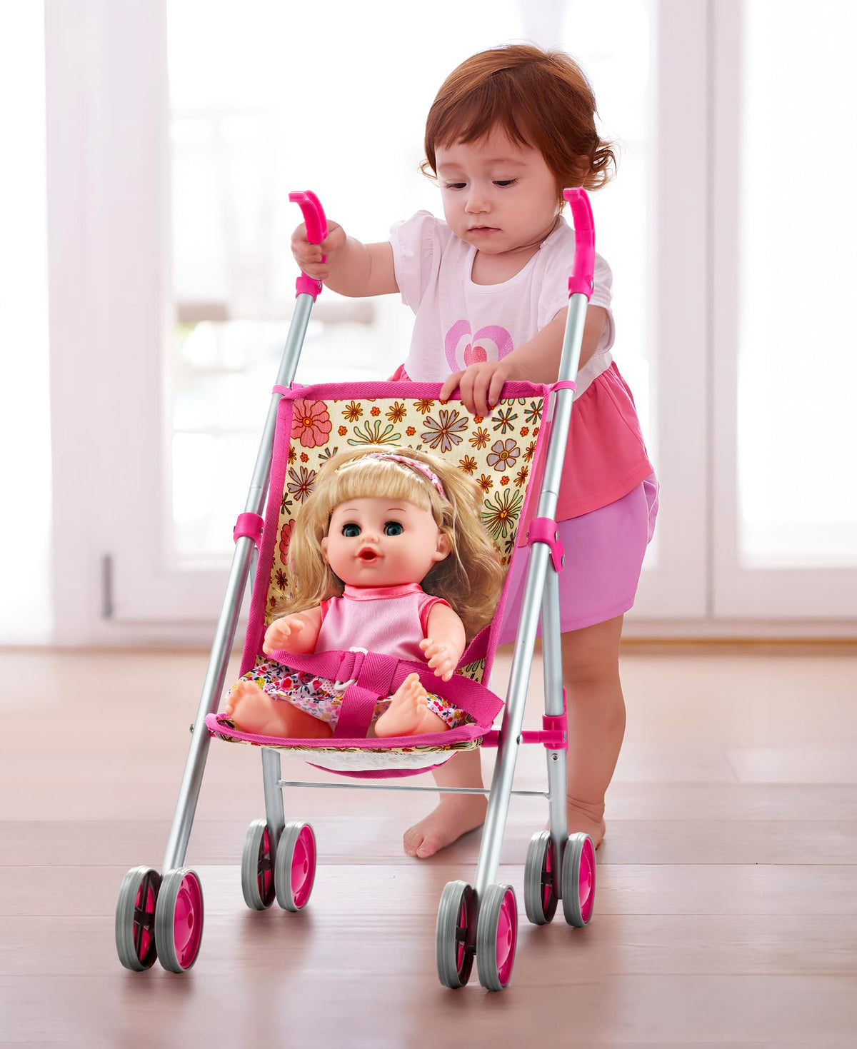 GAGAKU doll bottle drinking action promotes nurturing role-play and care routines.