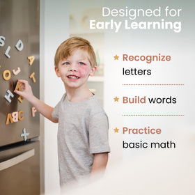 Gale Tots durable magnets securing letters to a whiteboard during lessons.