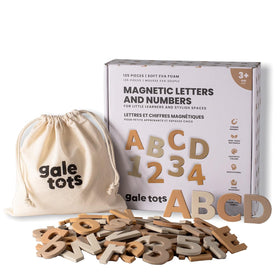 GALE TOTS magnetic letters and numbers on the fridge support early literacy practice.