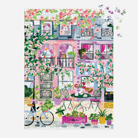 Galison Cherry Lane Blossoms spring palette enhances mood while solving this neighborhood puzzle.