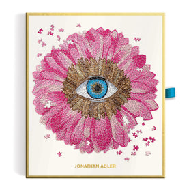 Jonathan Adler Petals puzzle arrives gift-ready in a stylish box.
