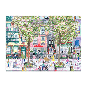 Galison Michael Storrings Cats in the City puzzle features playful cats on a busy street.