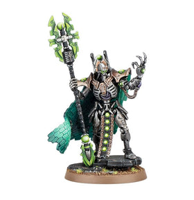 Games Workshop Imotekh The Stormlord weapons close-up, showcasing the Staff of the Destroyer and Gauntlet of Fire.