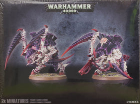 Games Workshop Carnifex Brood being assembled for dynamic tabletop poses.