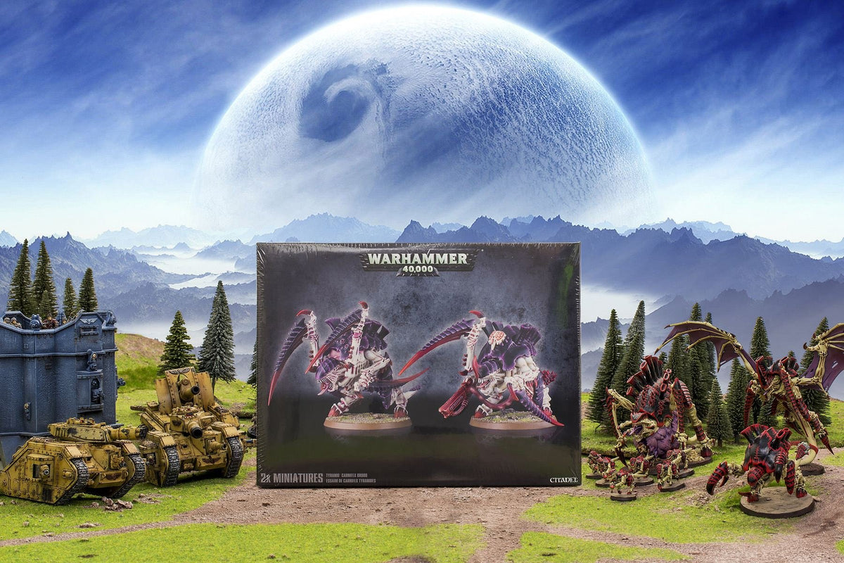 Games Workshop Carnifex Brood shown with multiple weapon options for customization.