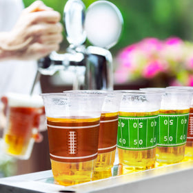 Gatherfun tailgate party cups in use at an outdoor game-day setup.