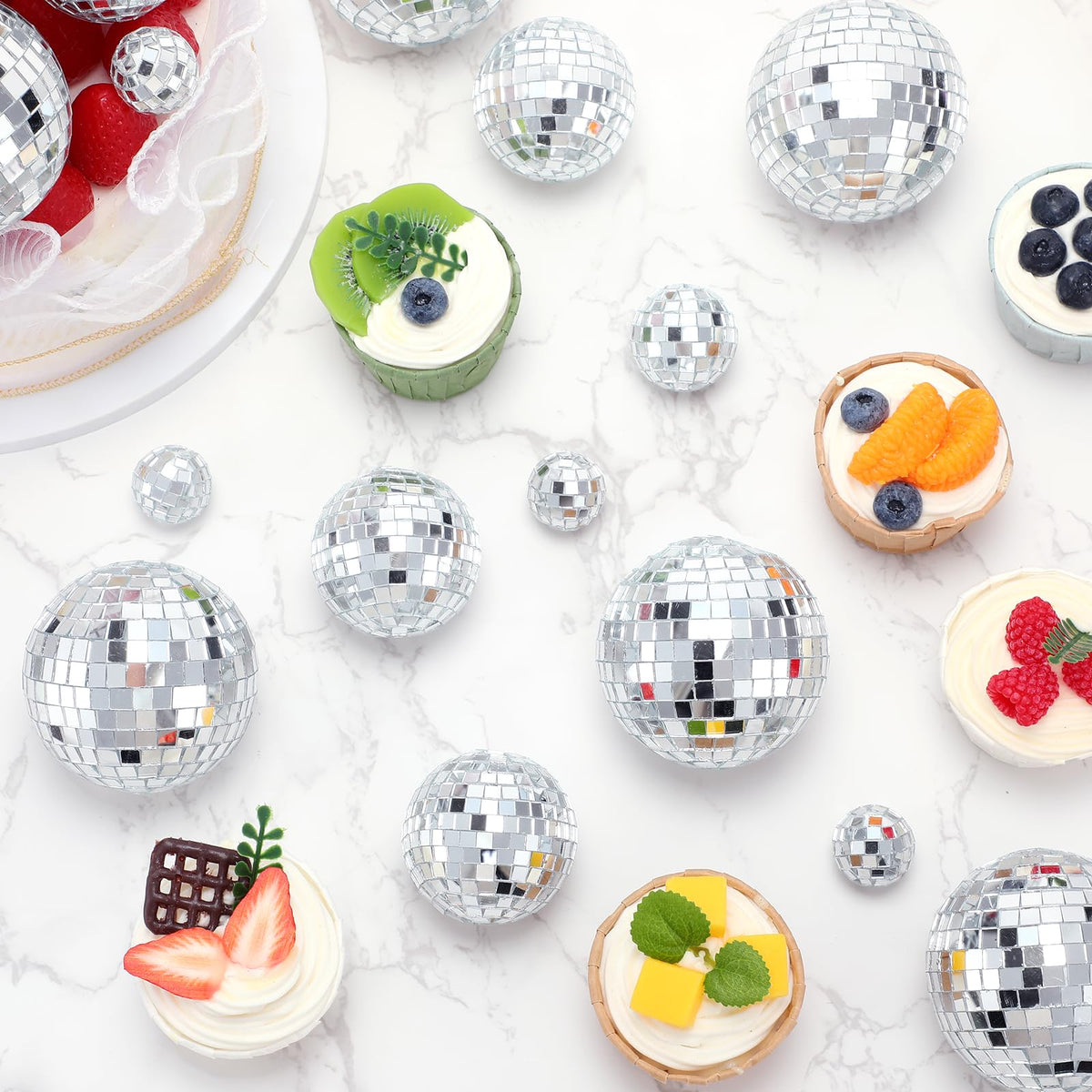 Geetery disco ball topper for weddings and parties adds reflective accents