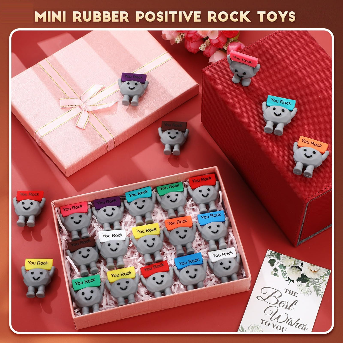Gejoy small rubber stone You Rock resting on a notebook desk