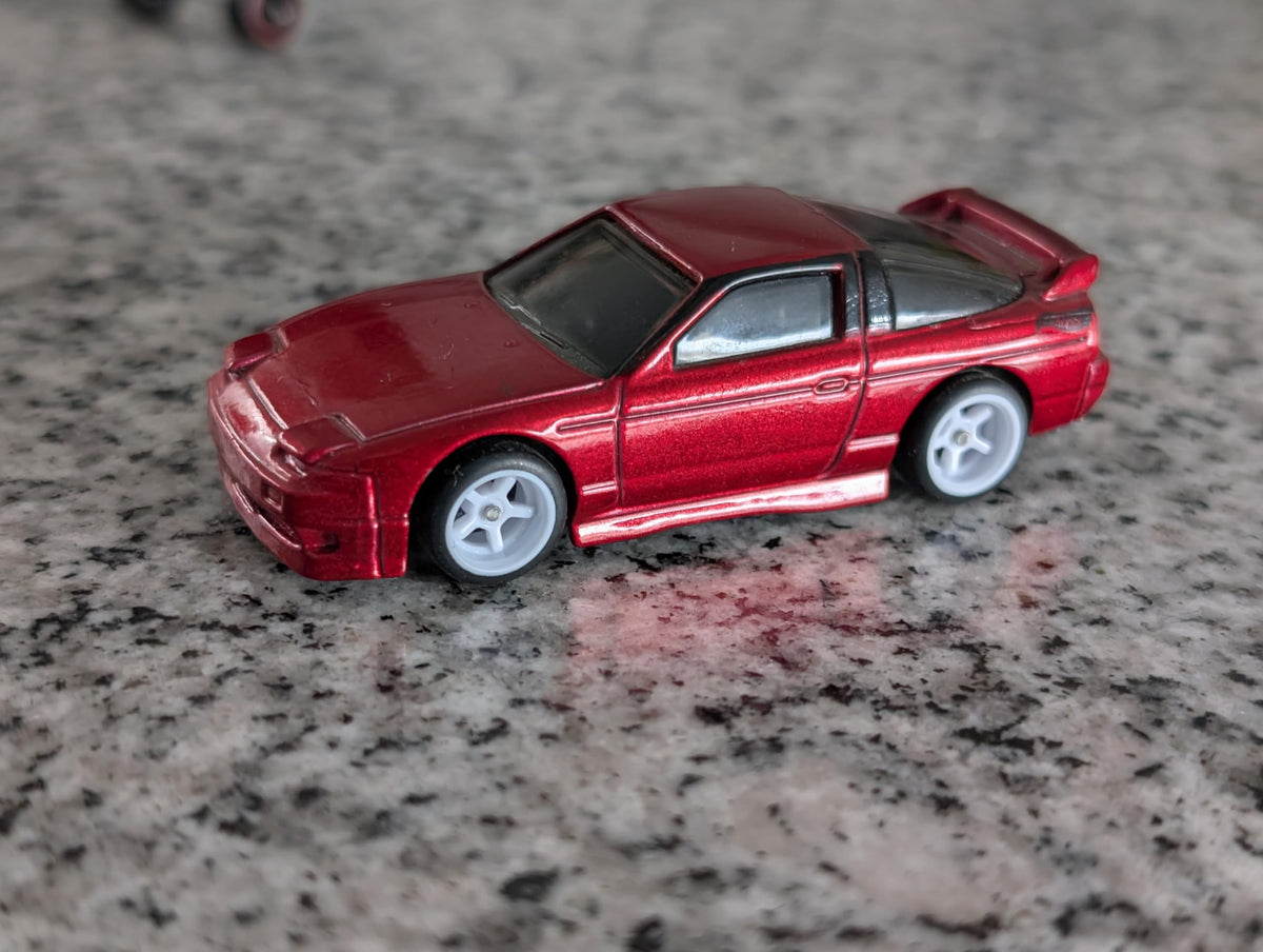 Generic 1:64-scale customization kit provides ready-to-use wheels and axles.