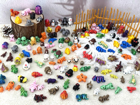 Generic 150pc 3D printed animal figurines featuring articulated joints for posing.