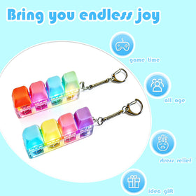 Generic 4-pack fidget keyboard keychain in lavender glows softly for night-time play.