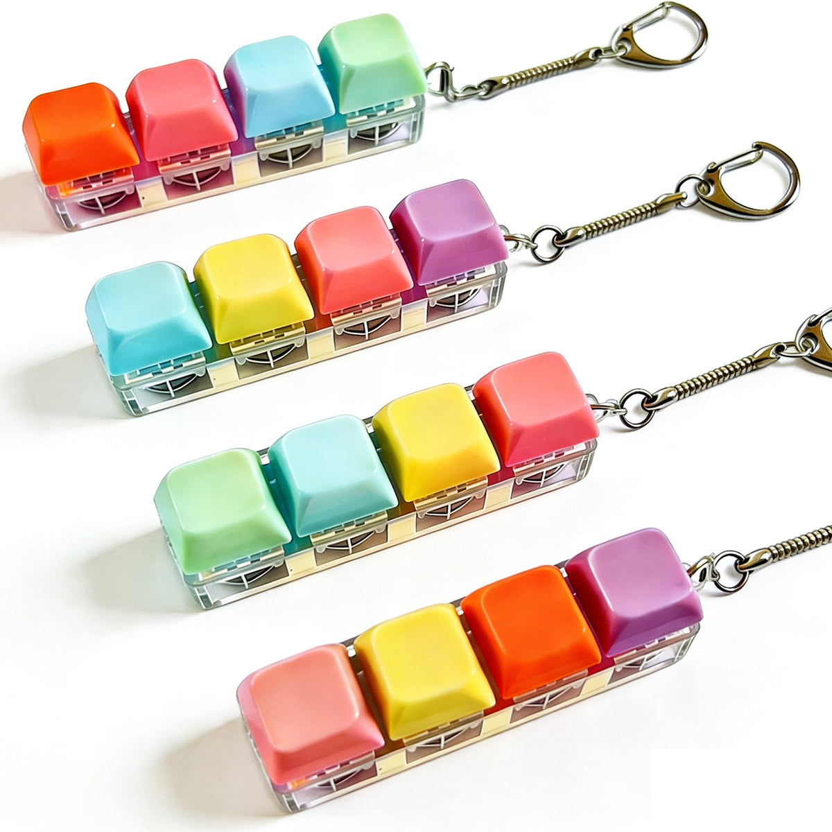 Generic 4-pack fidget keyboard keychain in mint aids focus during study sessions.