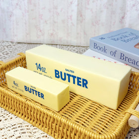 Generic butter-scented prank gift promotes playful desk moments.