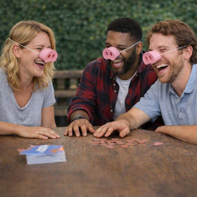 Generic Pig Nose Game cards ready for quick, humorous challenges at gatherings.