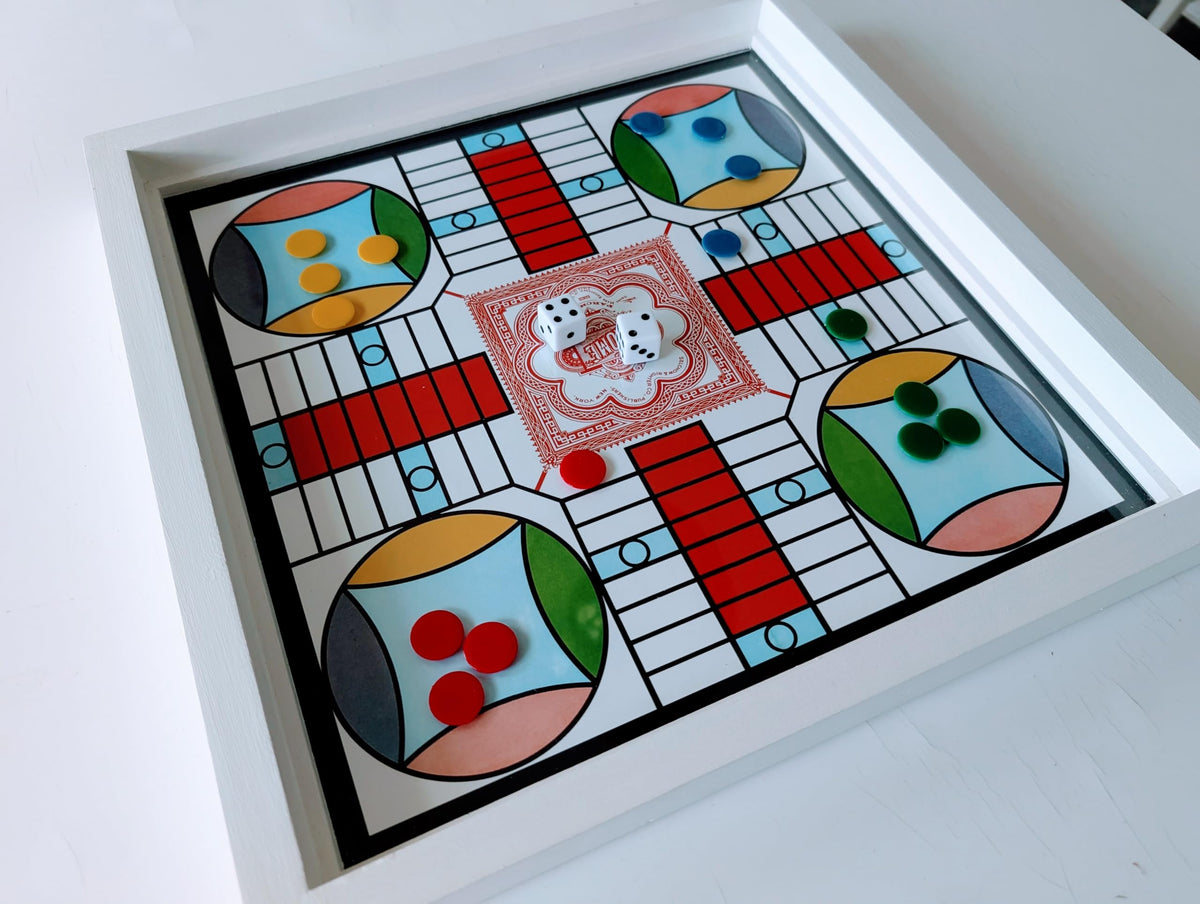Generic Snakes and Ladders on glass top for quick luck-based fun