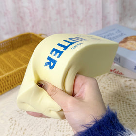 Generic large stress-relief squishy supports mindful squeezing with both hands.